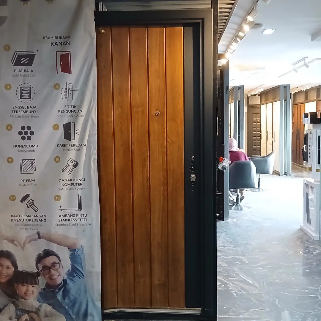 foto pintu baja fortress motif urat kayu asli